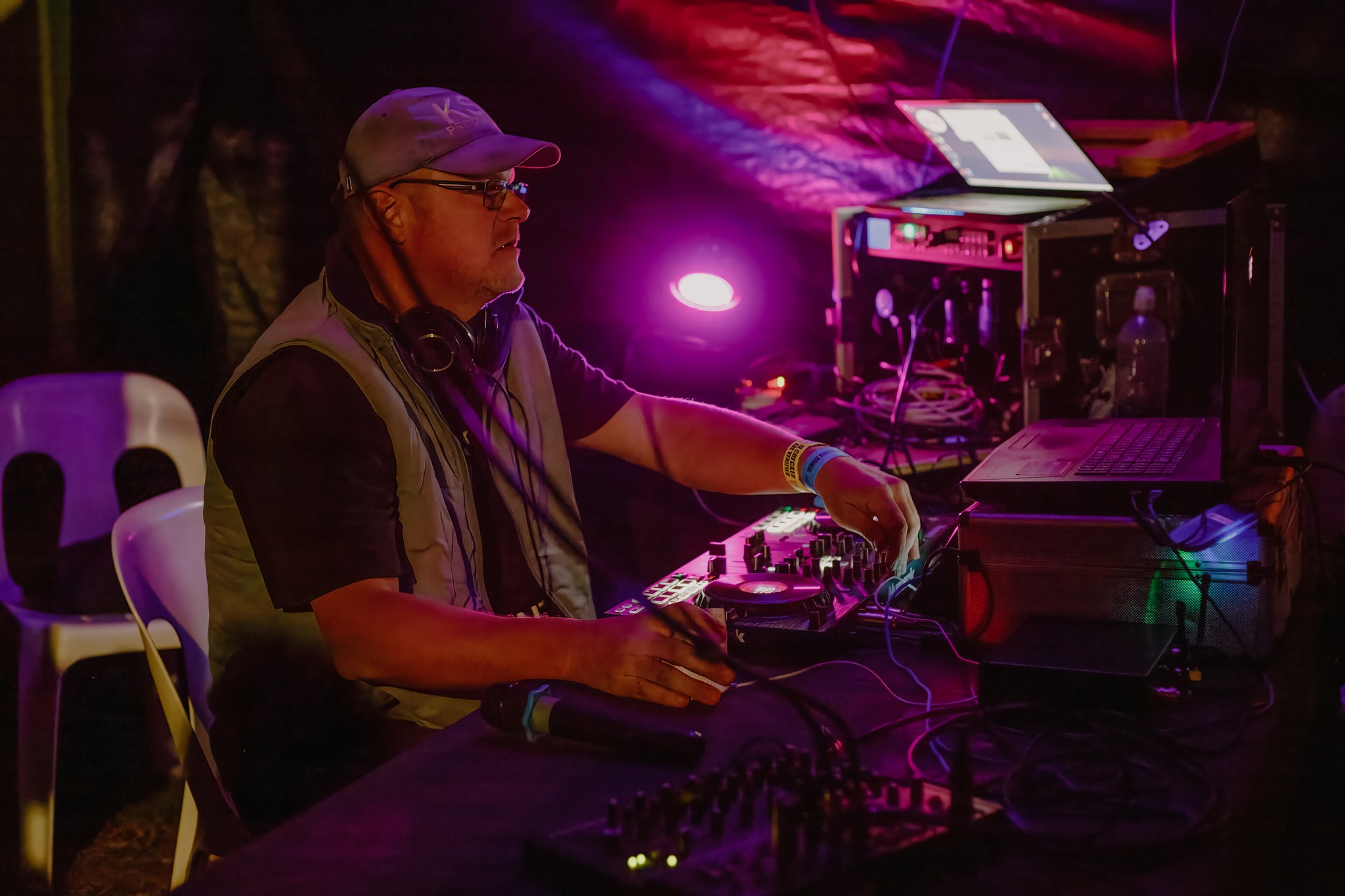 A DJ playing at the Dingo Races after party